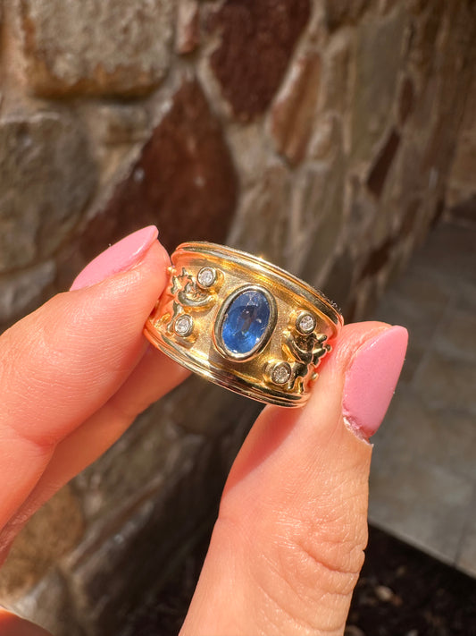 14k sapphire ring with cherubs