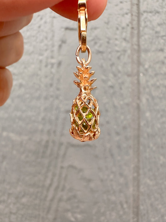 14k pineapple charm with peridot stones